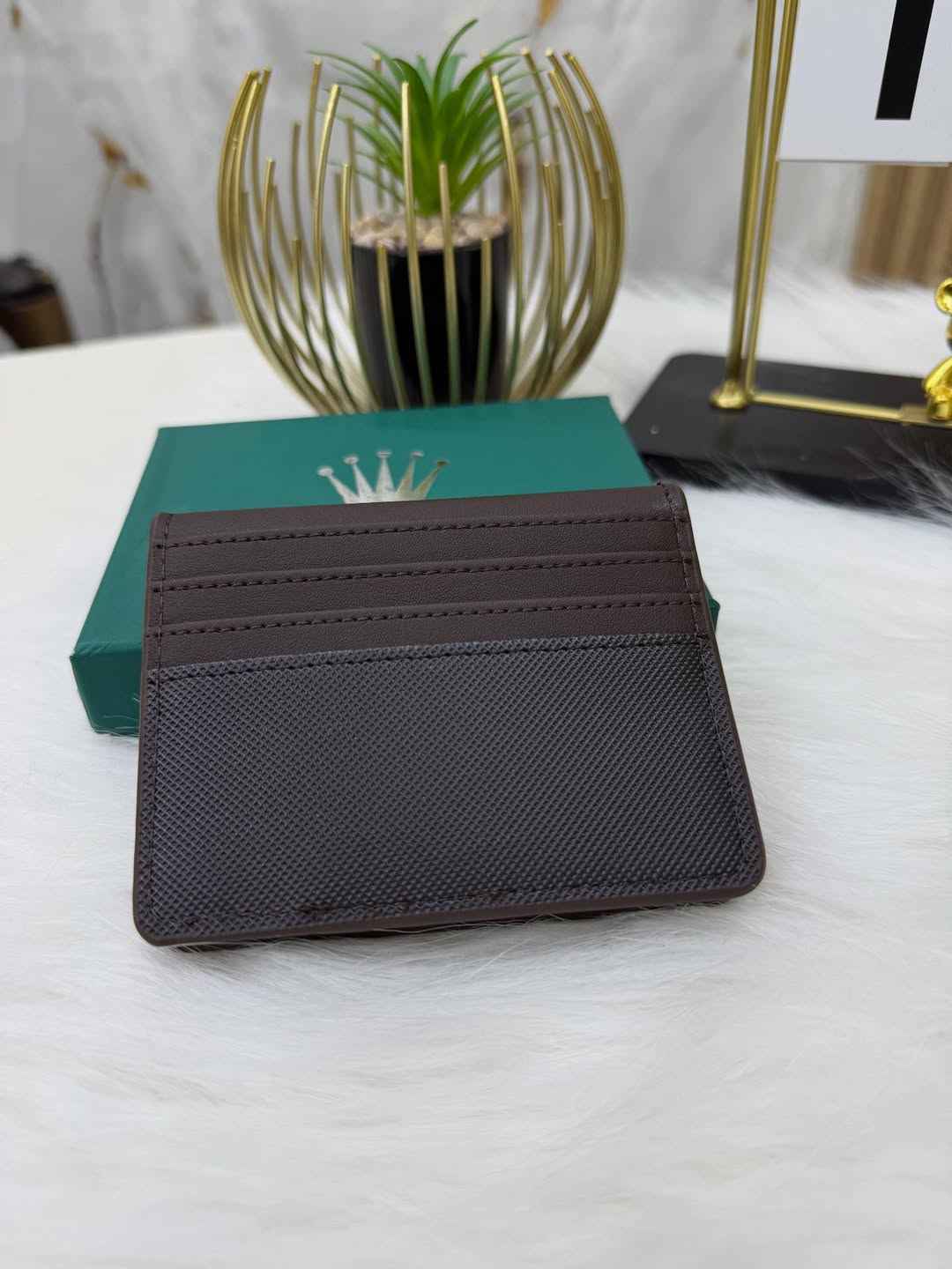 Rolex sleek bi-fold wallet