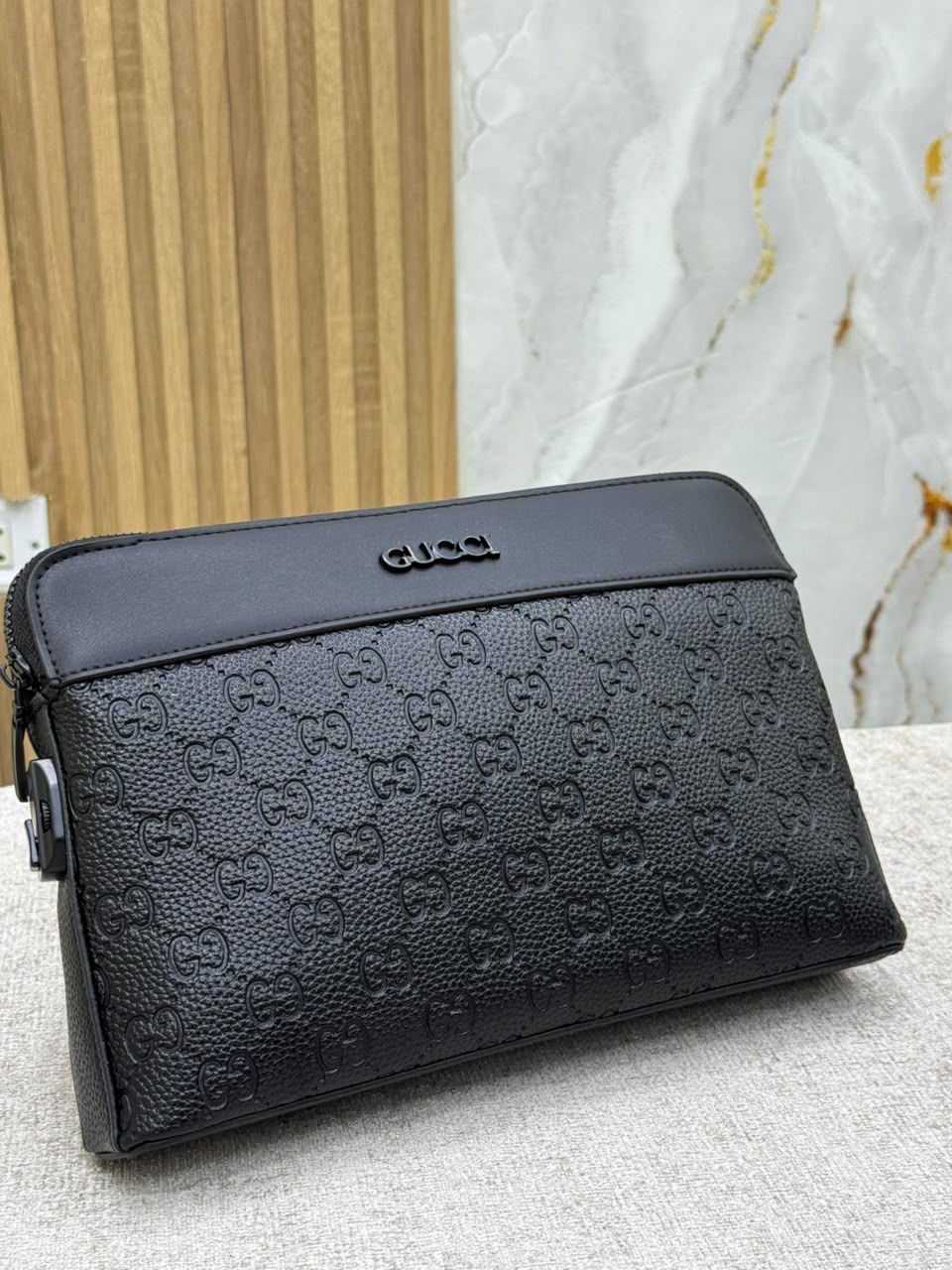 Obsidian Monogram Clutch Bag