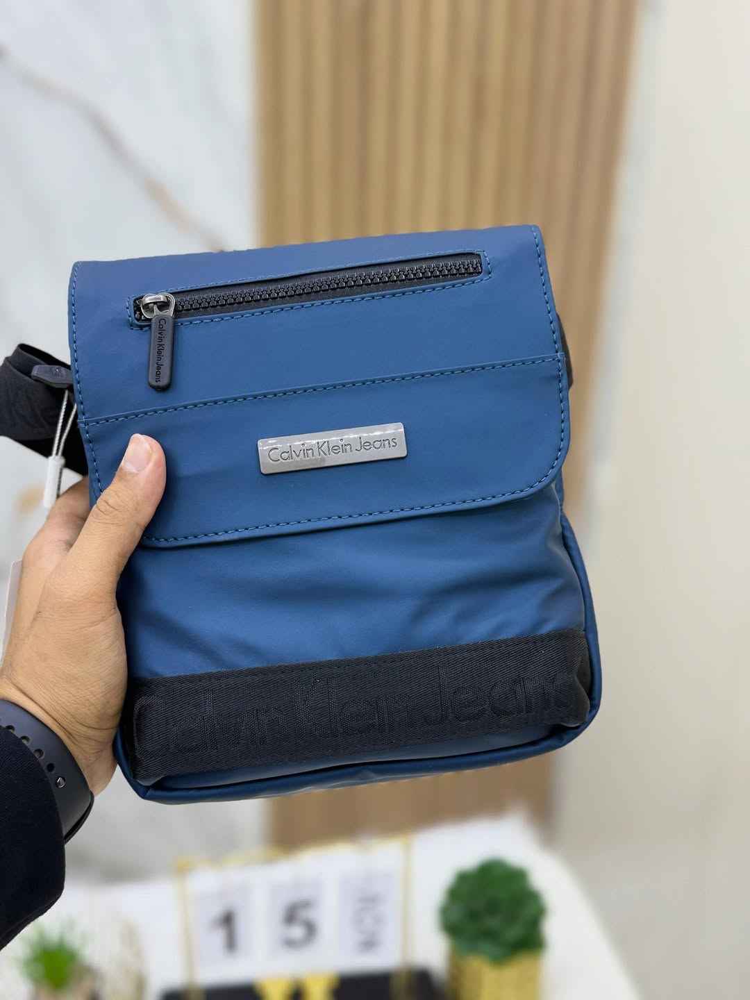 The Calvin Klein Shadow Pouch Bag