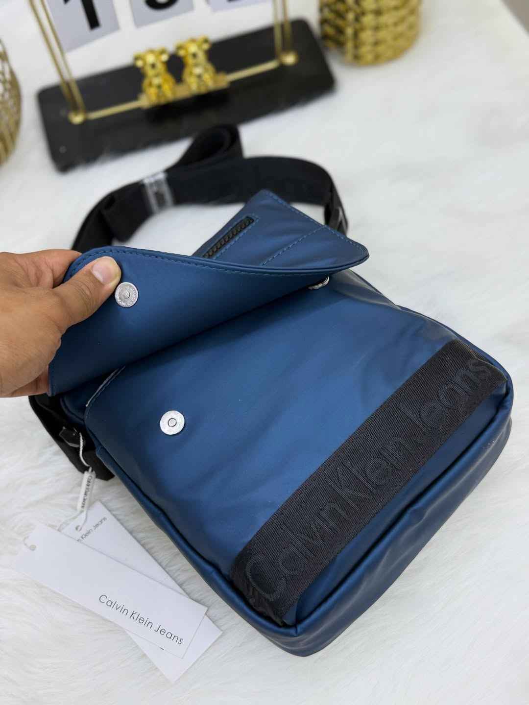 The Calvin Klein Shadow Pouch Bag