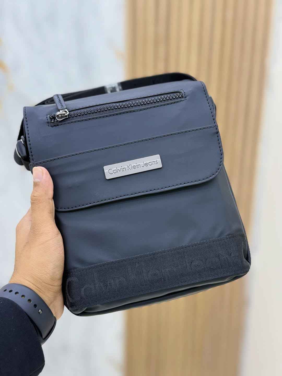 The Calvin Klein Shadow Pouch Bag