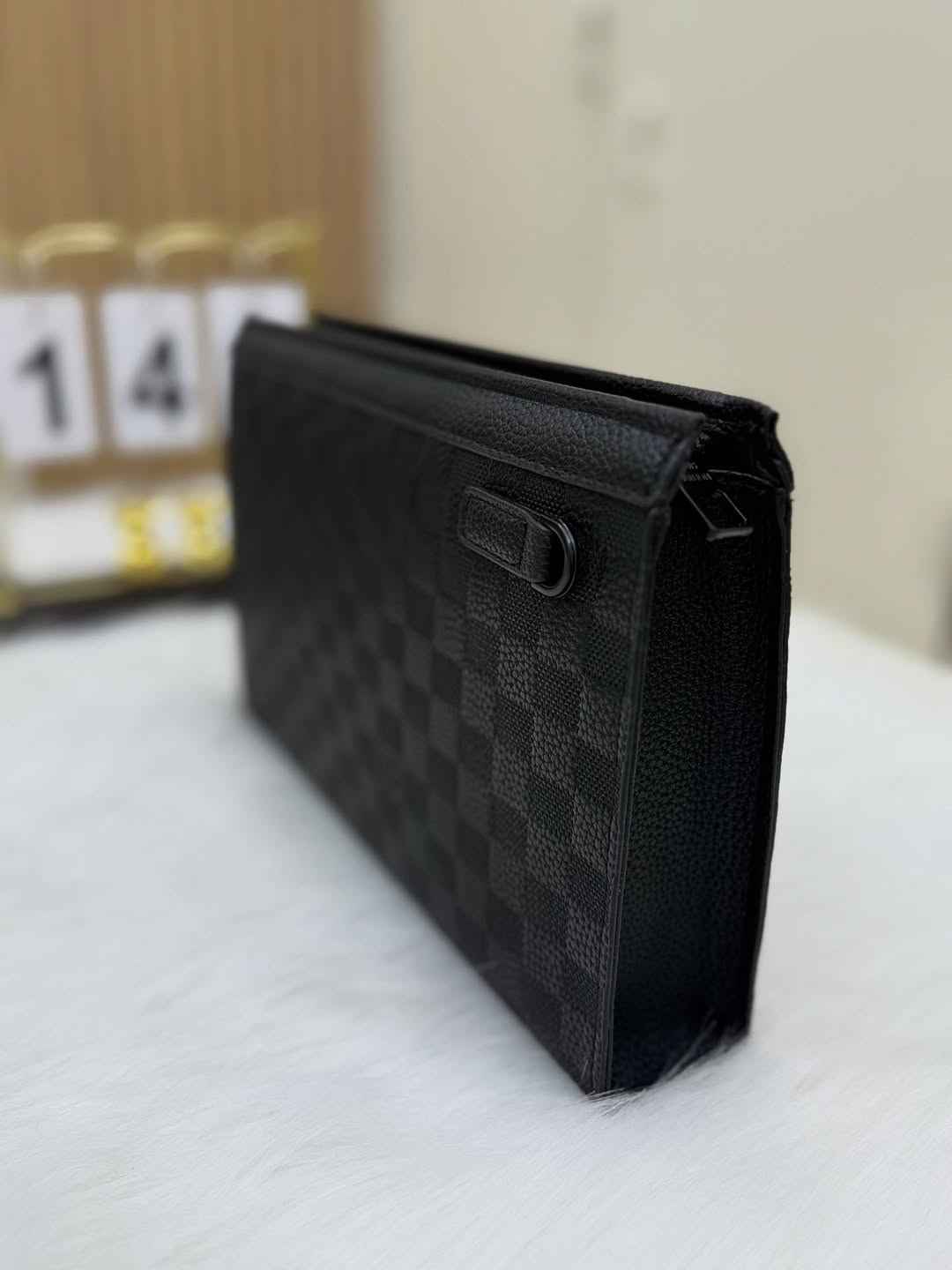 The Tailored Louis Vuitton Clutch