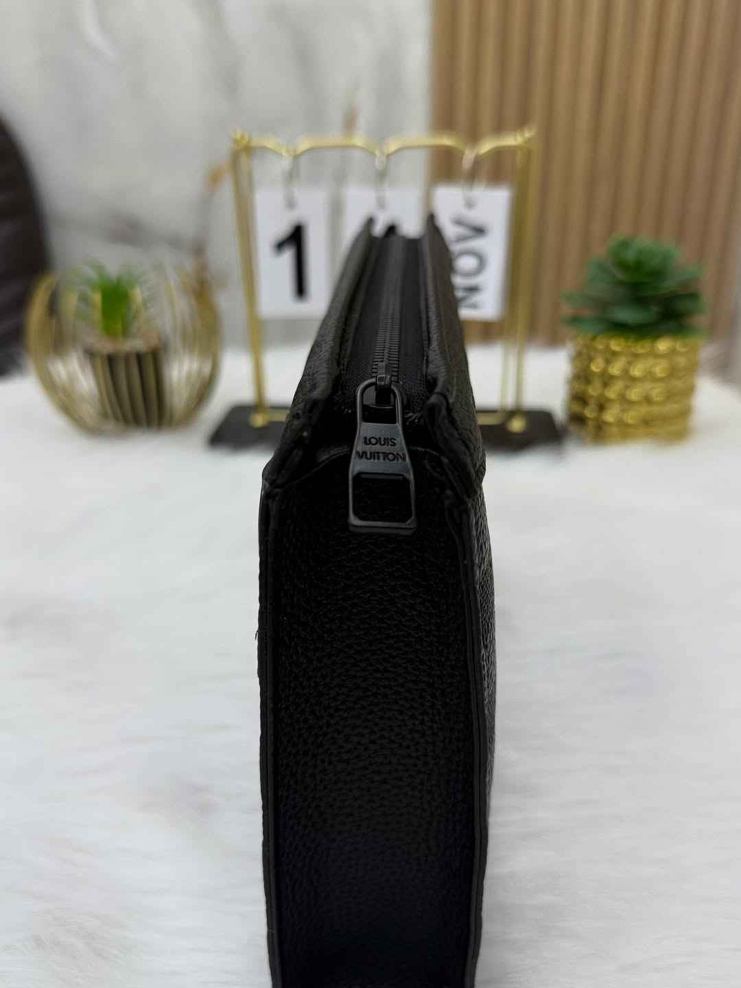 The Tailored Louis Vuitton Clutch