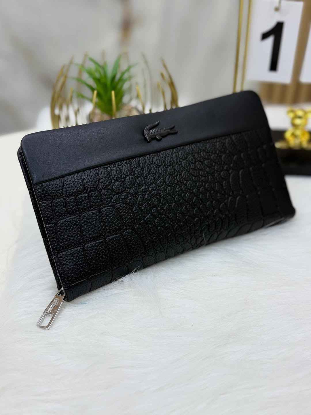Lacoste executive foldover clutch