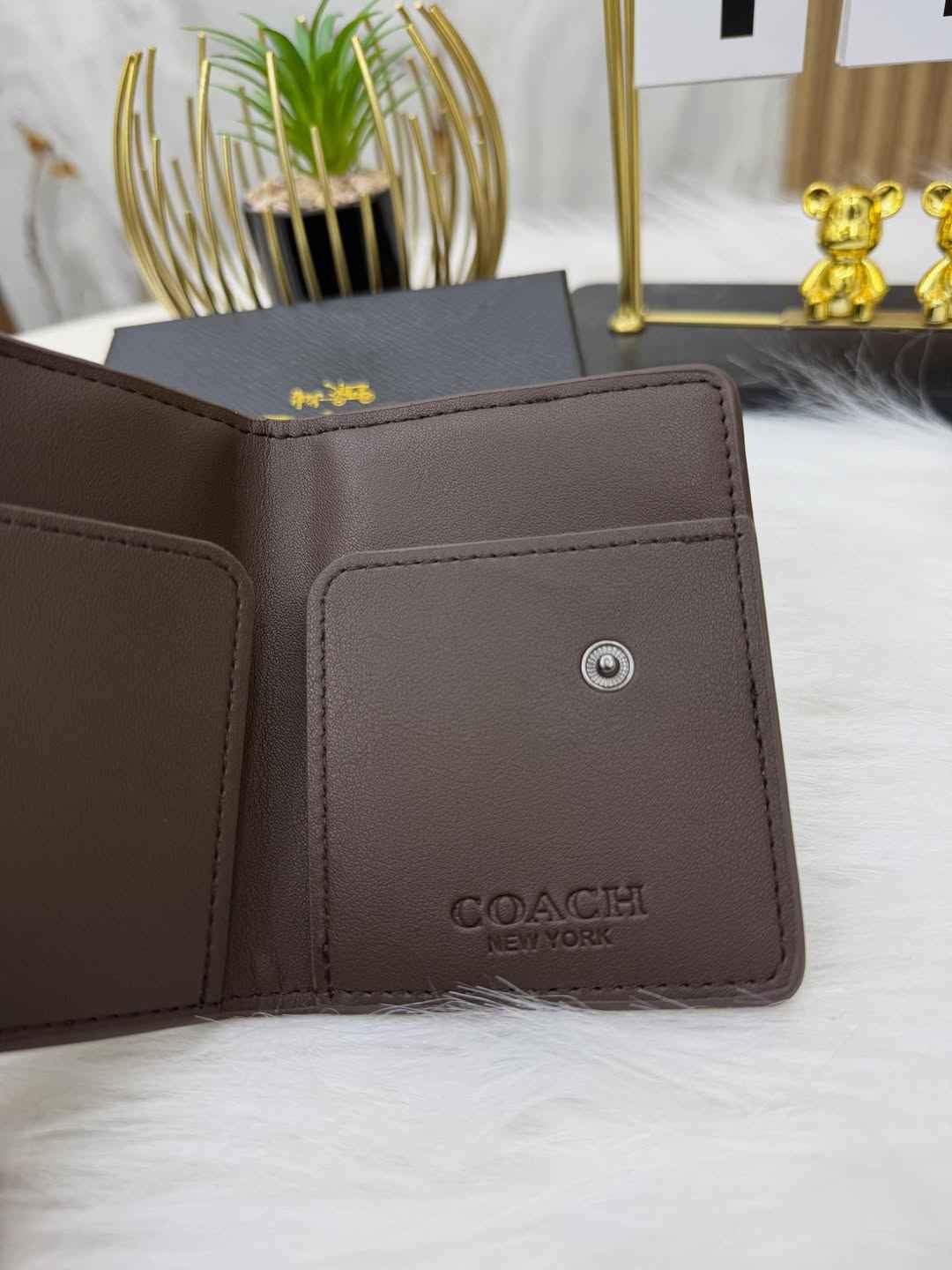 Coach sleek bi-fold wallet