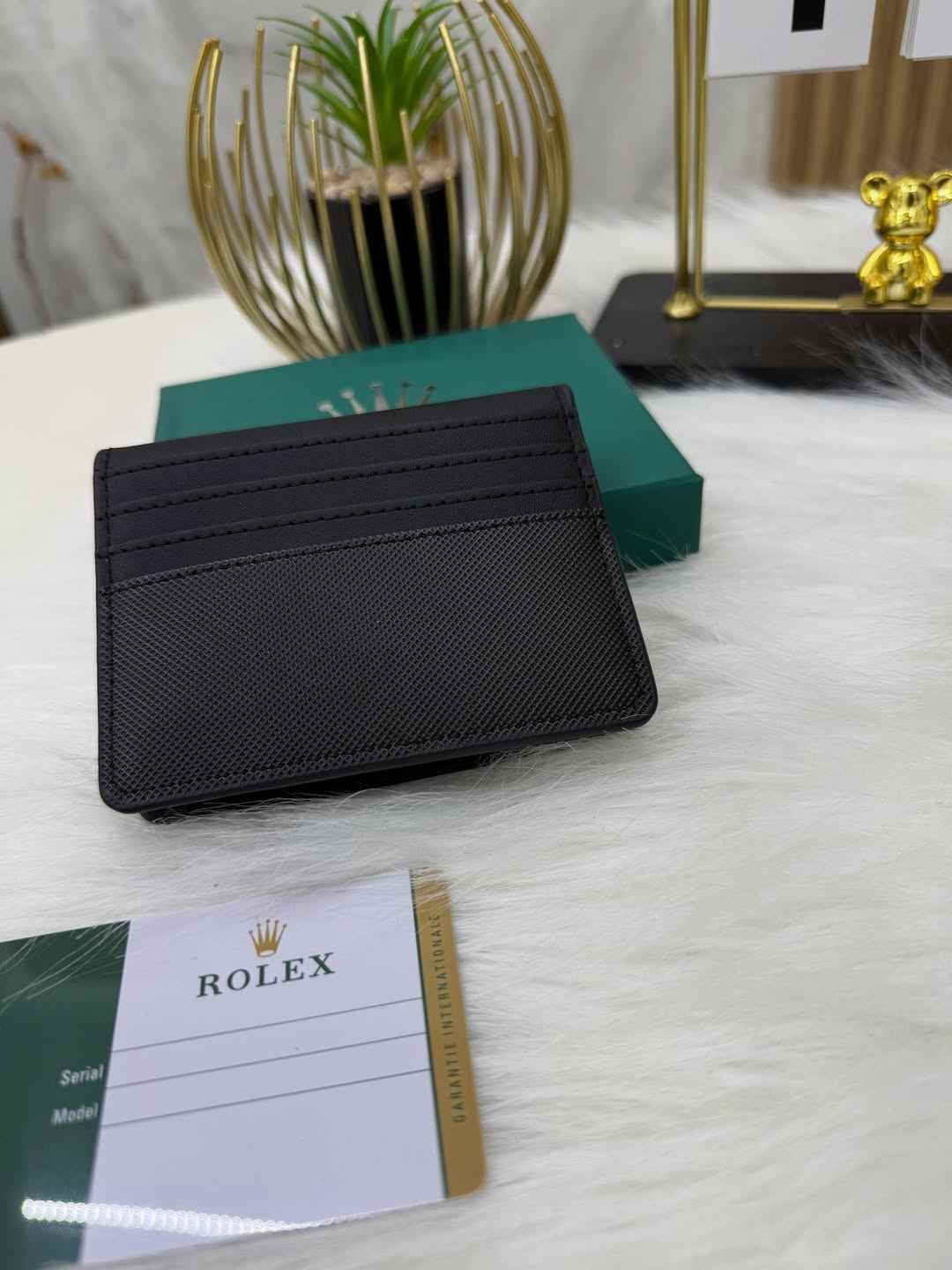 Rolex sleek bi-fold wallet