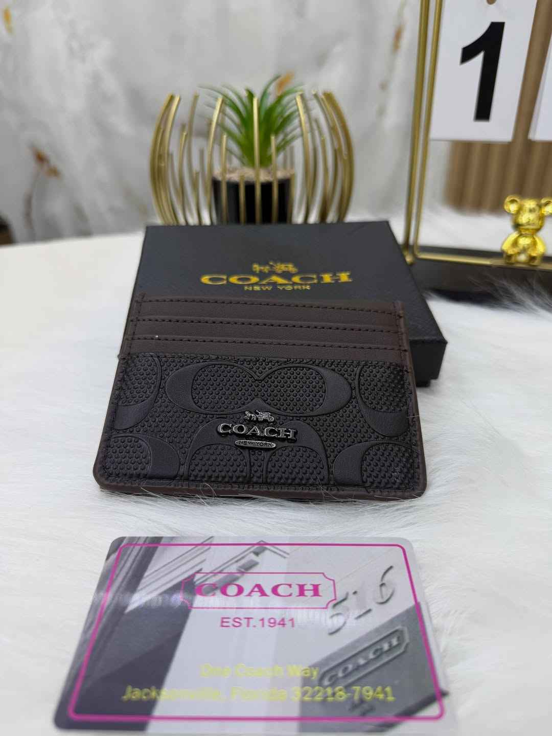 Coach sleek bi-fold wallet
