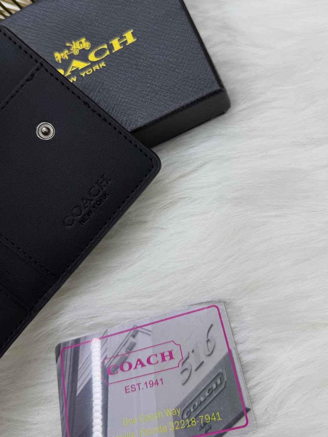 Coach sleek bi-fold wallet