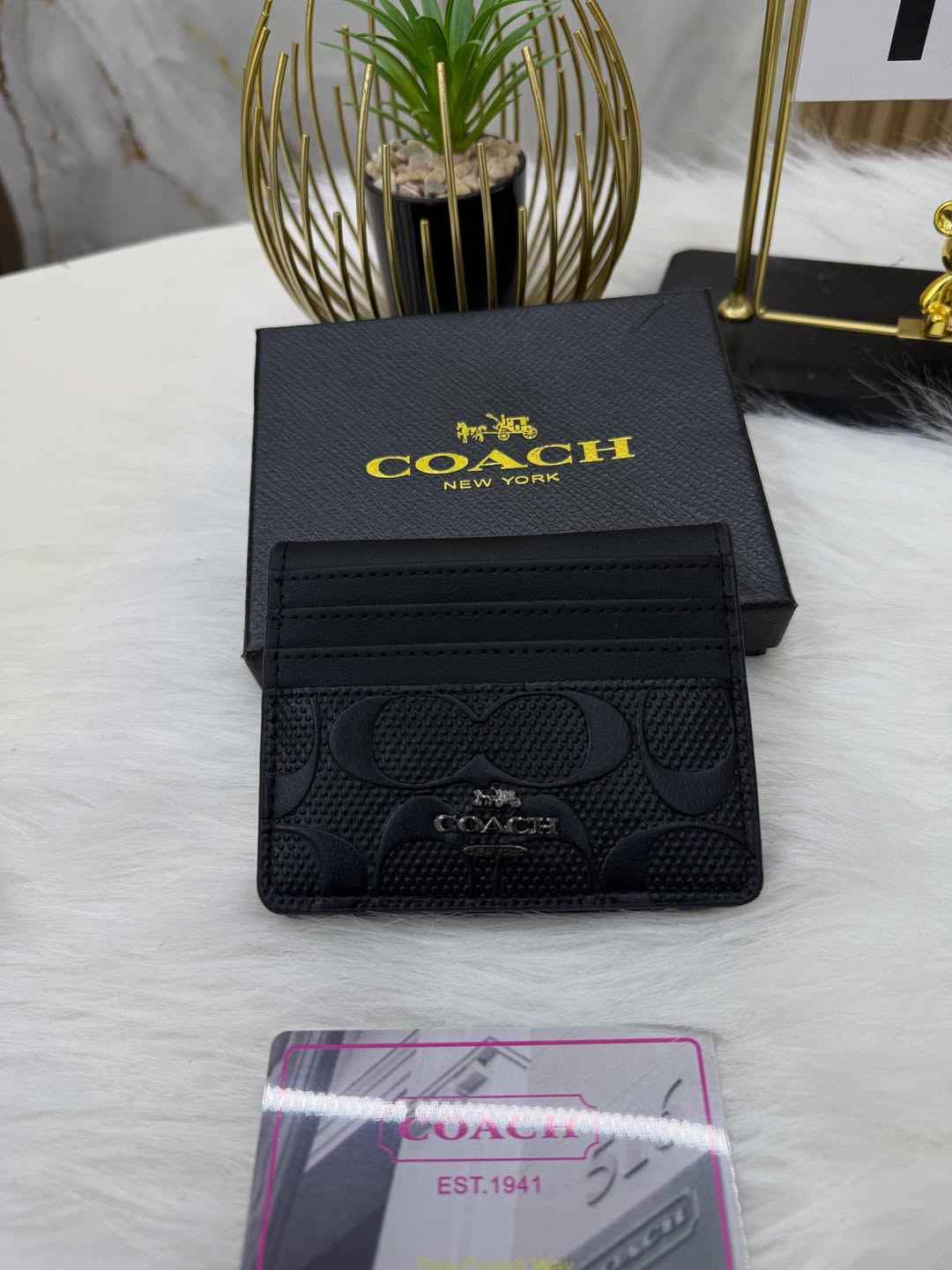 Coach sleek bi-fold wallet