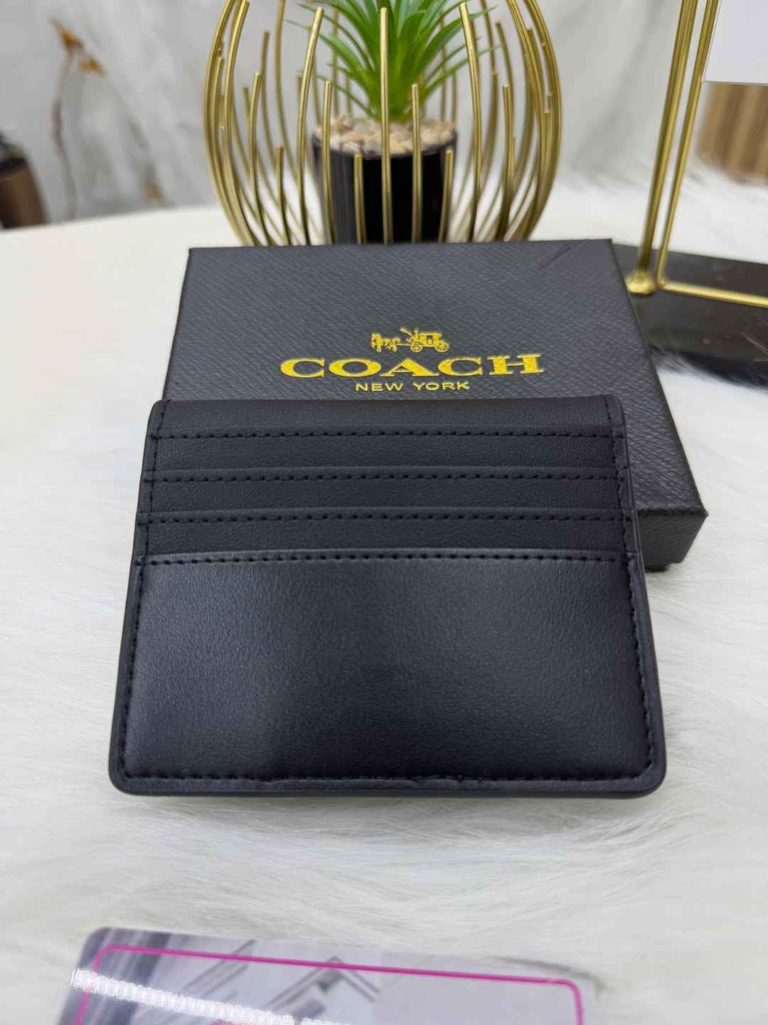 Coach sleek bi-fold wallet
