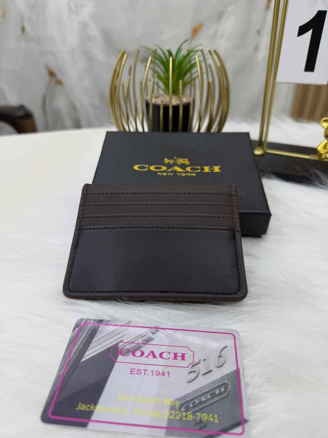 Coach sleek bi-fold wallet