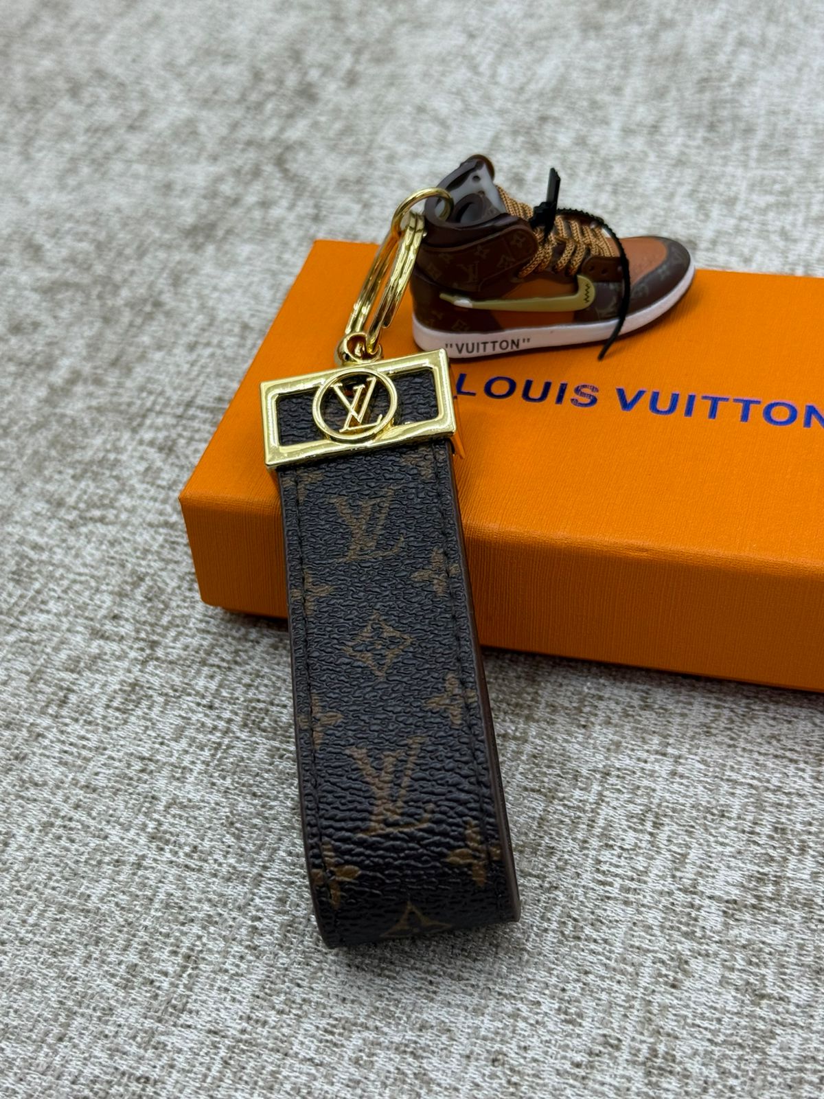 Louis Vuitton Titan Crest Keychain