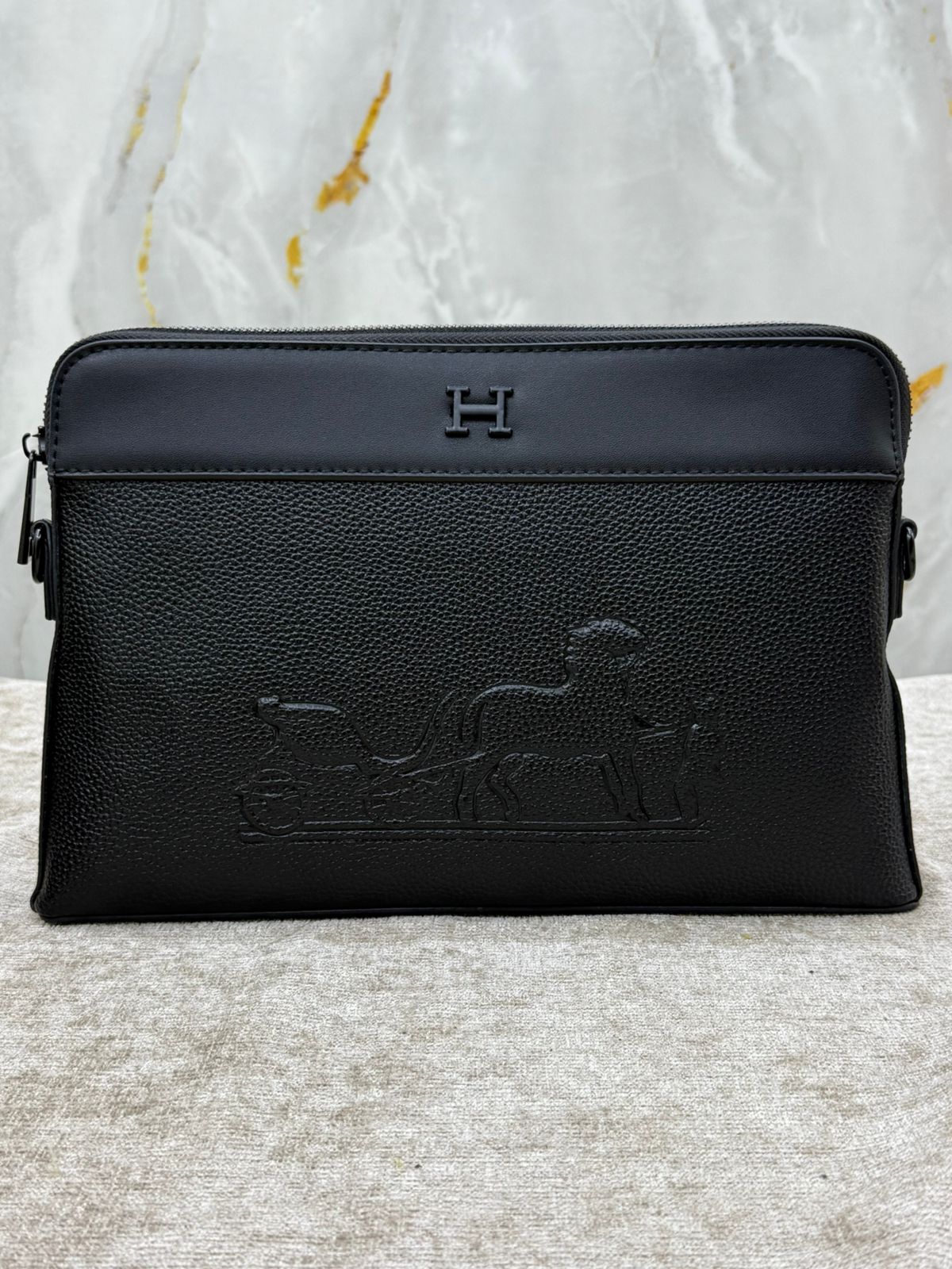 Hermès Leather Clutch Bag with Embossed Horse Carriage Logo