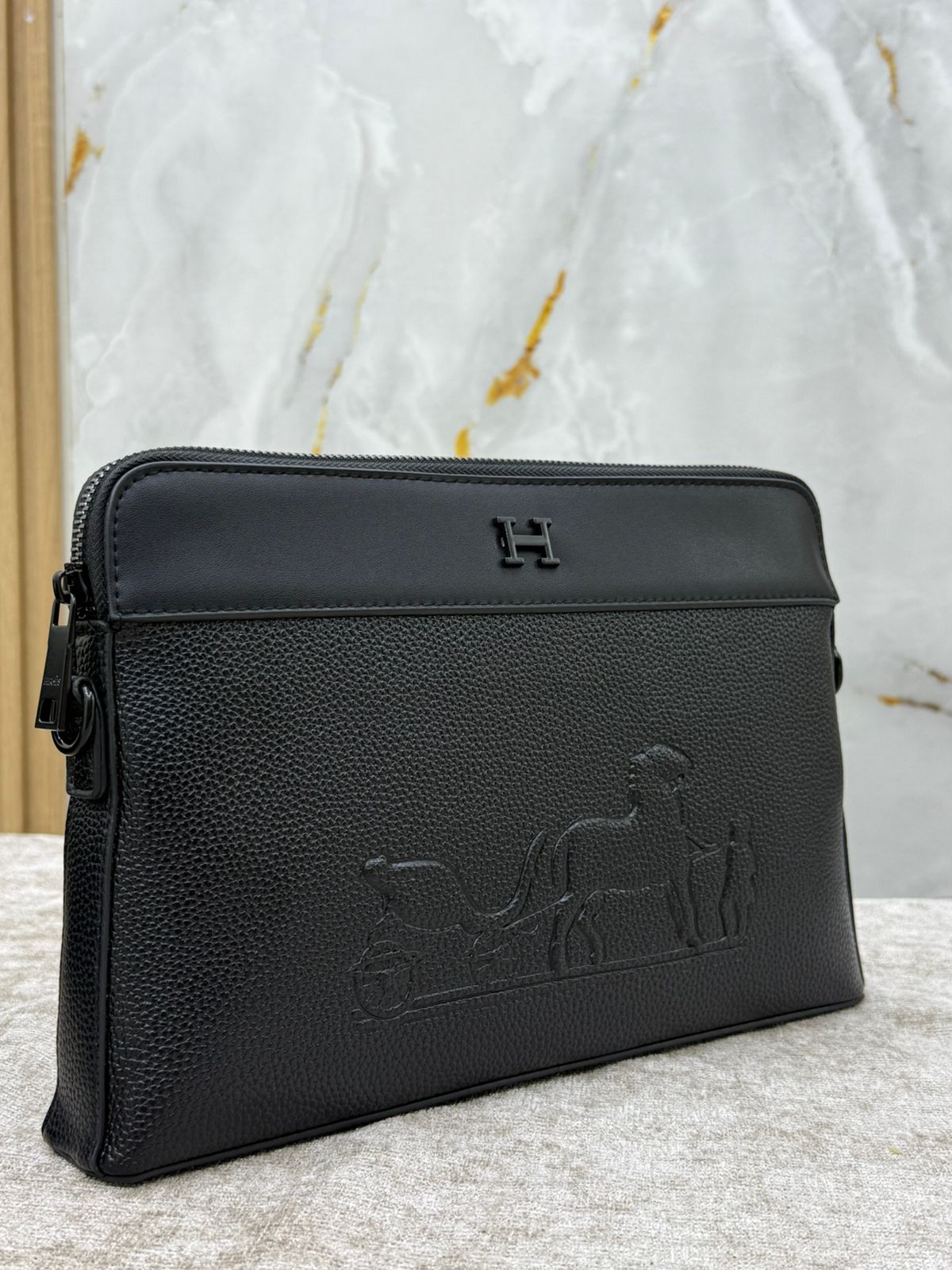 Hermès Leather Clutch Bag with Embossed Horse Carriage Logo