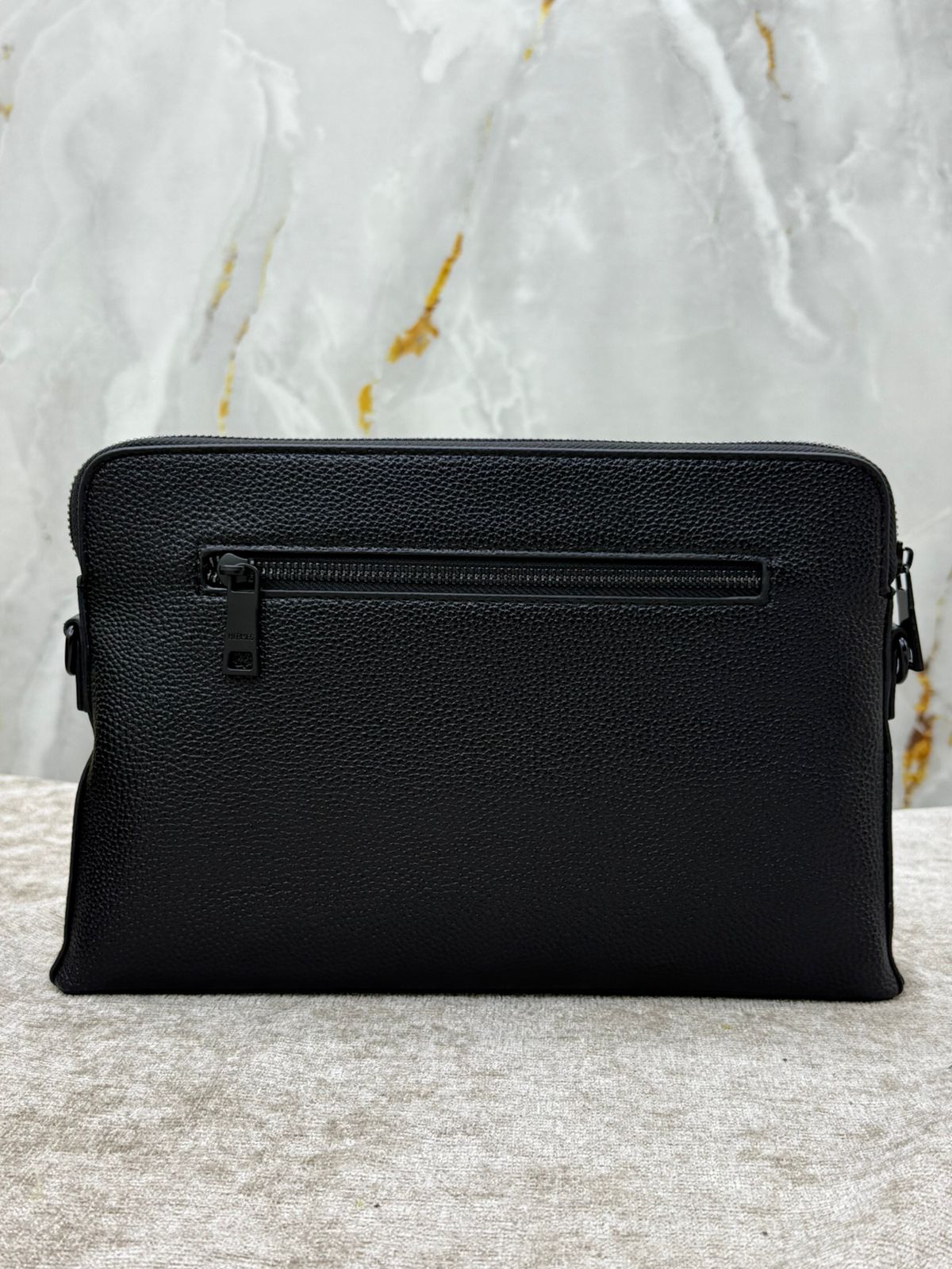Hermès Leather Clutch Bag with Embossed Horse Carriage Logo