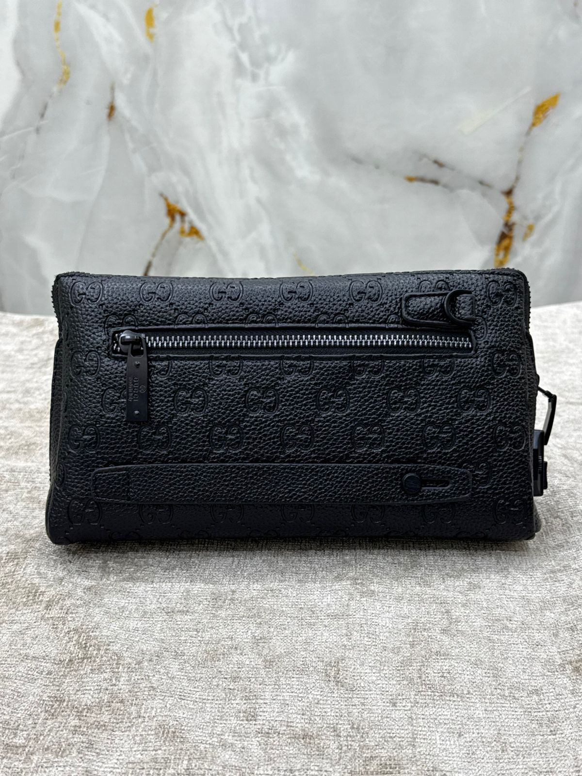 Gucci Monogram Leather Clutch Bag