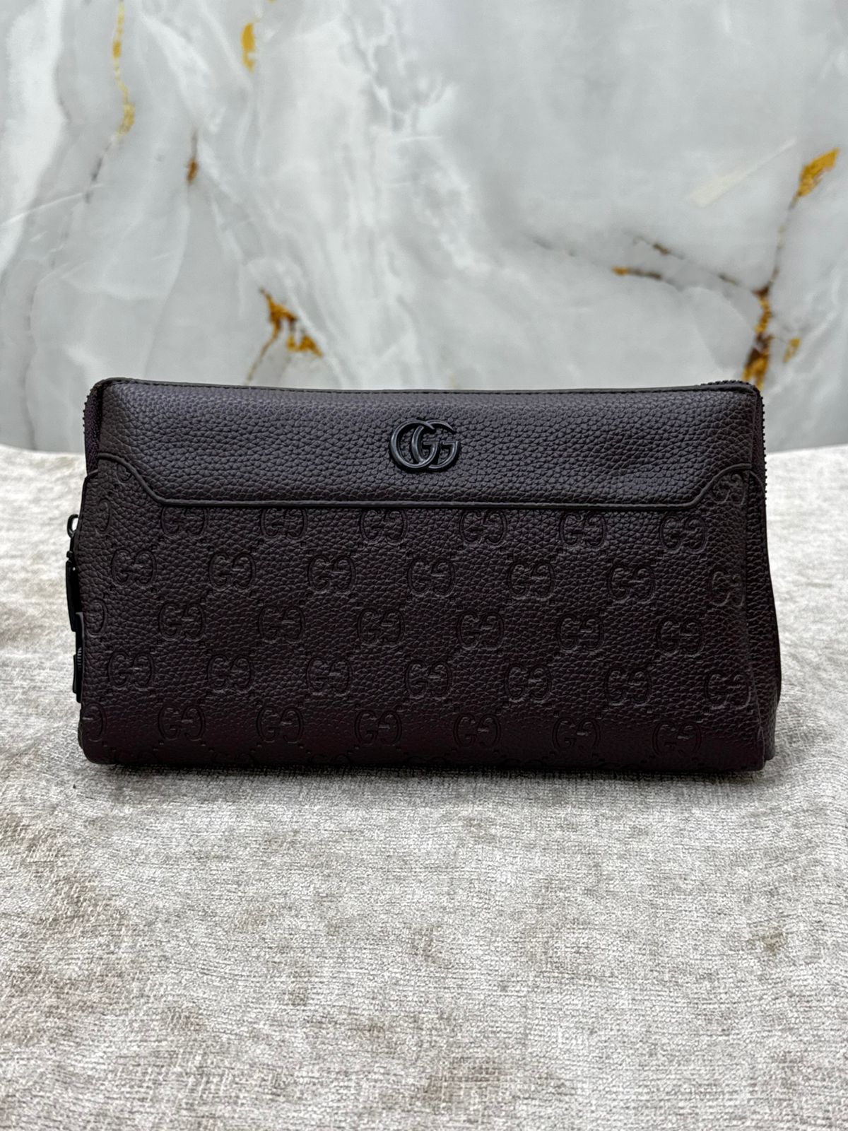 Gucci Monogram Leather Clutch Bag