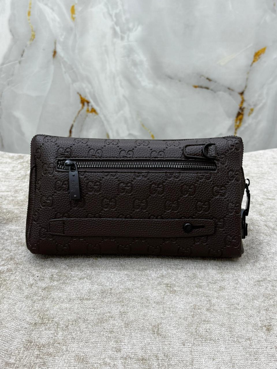 Gucci Monogram Leather Clutch Bag