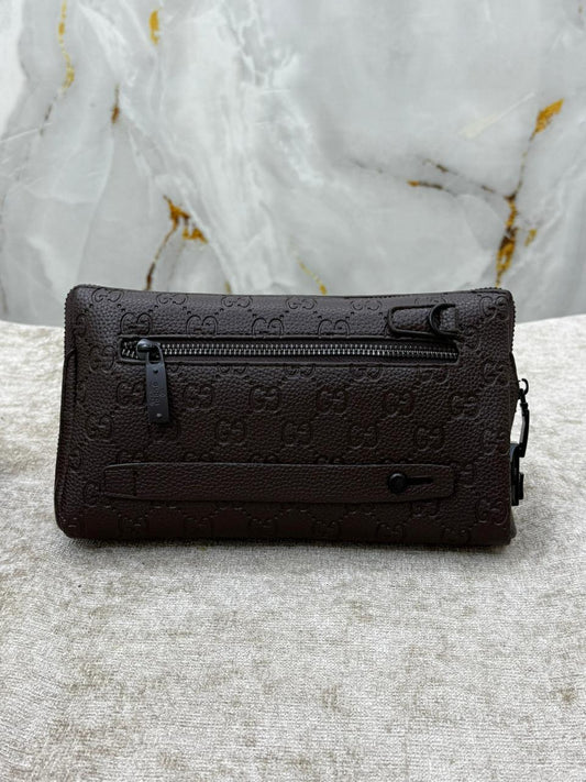 Gucci Monogram Leather Clutch Bag