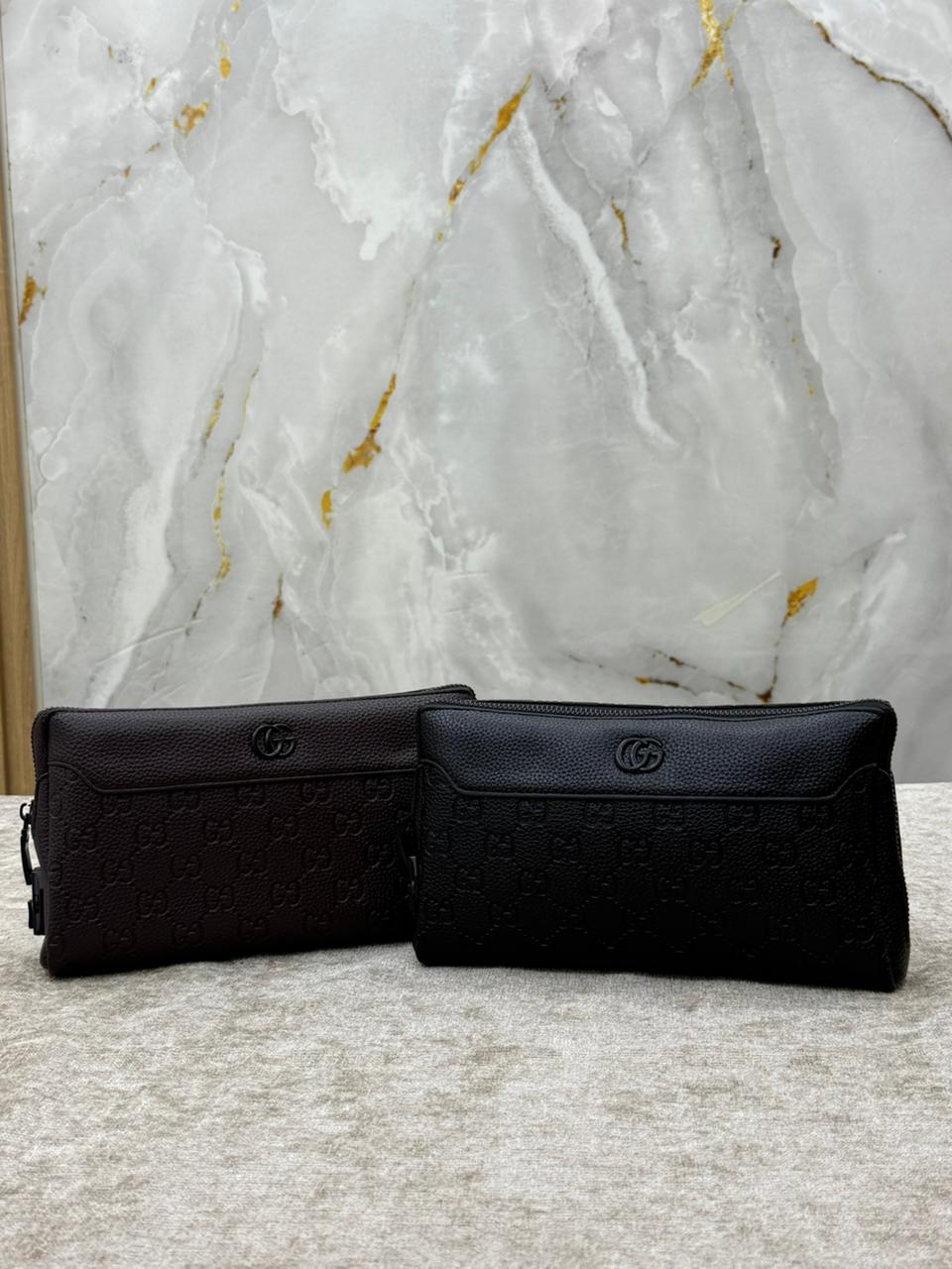 Monogram Leather Clutch Bag