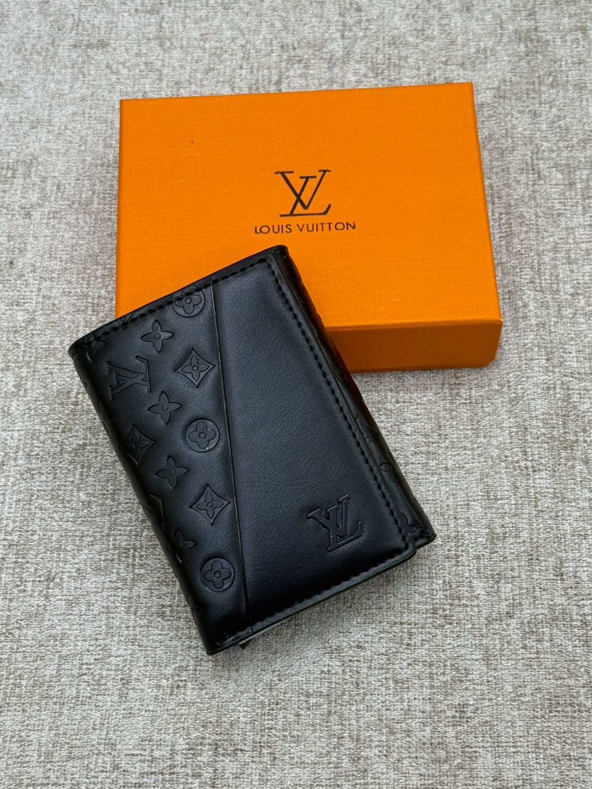 Black Monogram Embossed Leather. - MA STORE